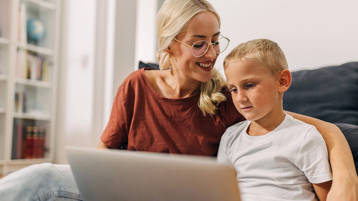 Family attending an telehealth behaviour support session from home.