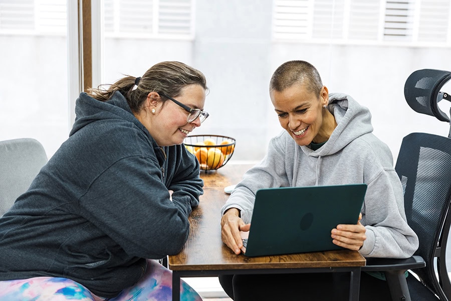 Behaviour Practitioner creating an NDIS behaviour support plan for eating disorders with a client during a support session.