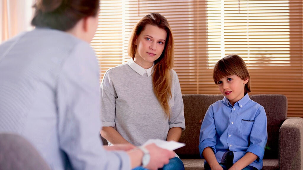 Practitioner providing autism behaviour support strategies to a family in Brisbane