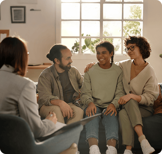 NDIS behaviour support services offered by Behaviour Collaborations team conducting a Positive Behaviour Support planning meeting with a practitioner, a teen and their parents