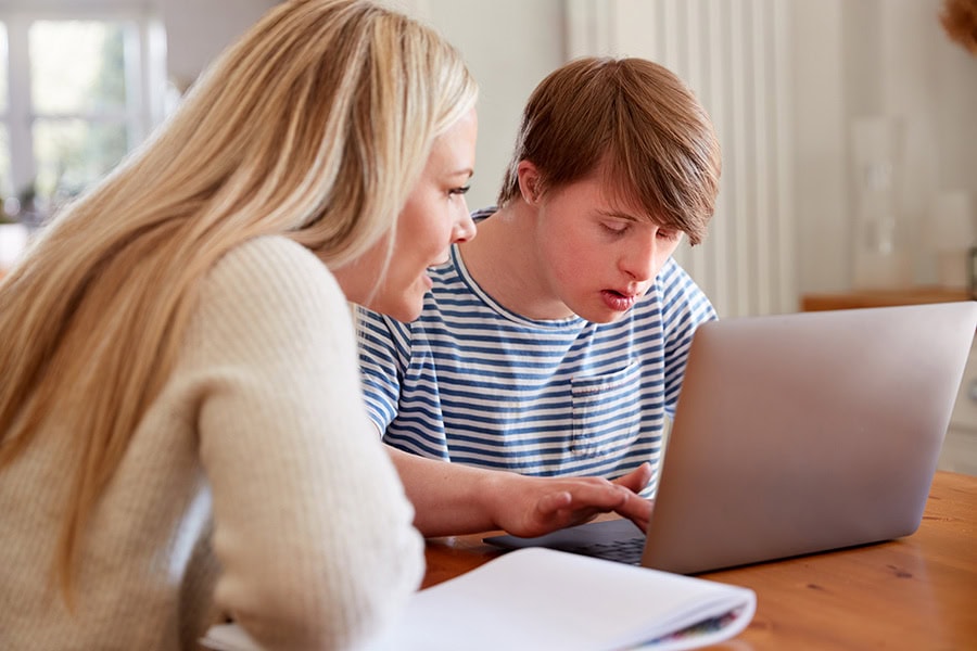 Age-appropriate conversations about war with a parent and child looking at information together