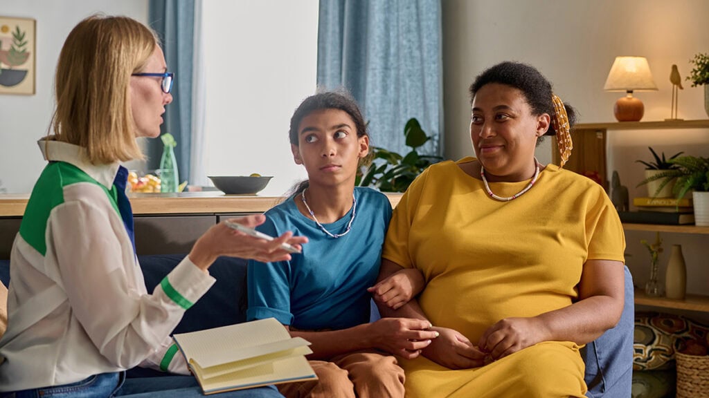 Behaviour support home visit with a family and NDIS practitioner