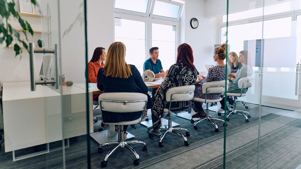 NDIS behaviour support accountability discussion with a practitioner and support team