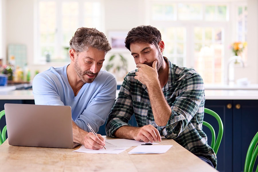 Provider and parent reviewing a report ahead of an NDIS plan reassessment